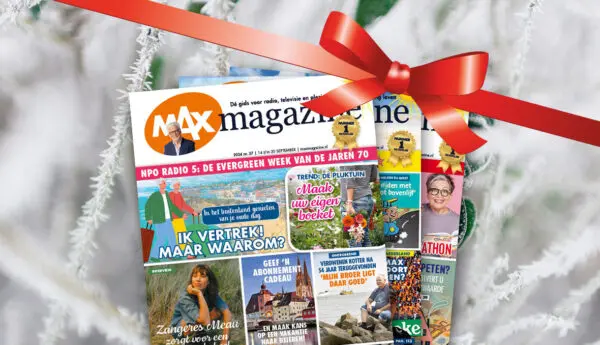 Die magazines van max magazine met winter achtergrond en rode strik